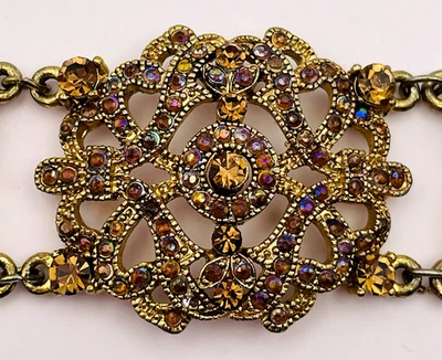 Brazalete estilo victoriano tono dorado con estrás marrón VCLM firmado Foto 1 de 4