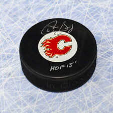 Phil Housley Calgary Autographed Hockey Puck with HOF Note