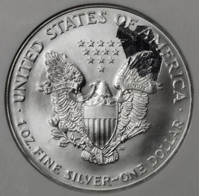 1999 NGC MS67 Huge Struck ThruSilver American Eagle Dollar Mint Error - Image 1 of 4