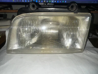 1995-1997 Kia Sportage OEM LH Driver Side Headlight - Image 1 of 4
