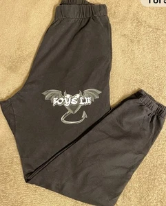 Pantalones de chándal Lie para mujer talla XS negros elásticos al tobillo dos lados/un bolsillo trasero  - Imagen 1 de 9