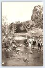 RPPC Cowboys Riding Horses  in River Western Vintage Real Photo Postcard A1