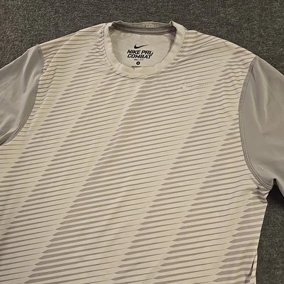 Camisa ajustada Nike Dri Fit Pro Combat para hombre blanca mediana S/S a rayas deportiva atlética Foto 1 de 4