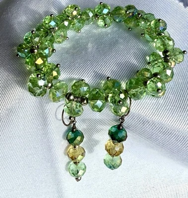 "Impresionante juego de pulsera y pendientes elásticos de 6"" con cuentas facetadas de cristal AB verde peridoto" Foto 1 de 4