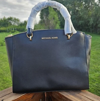 Bolso de mano Michael Kors Ellis grande de cuero negro convertible para damas Foto 1 de 4