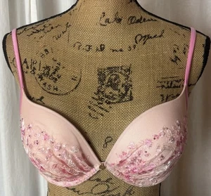 Reggiseno Victoria’s Secret rosa imbottito push up demi pizzo scintillante taglia 36C - Foto 1 di 6