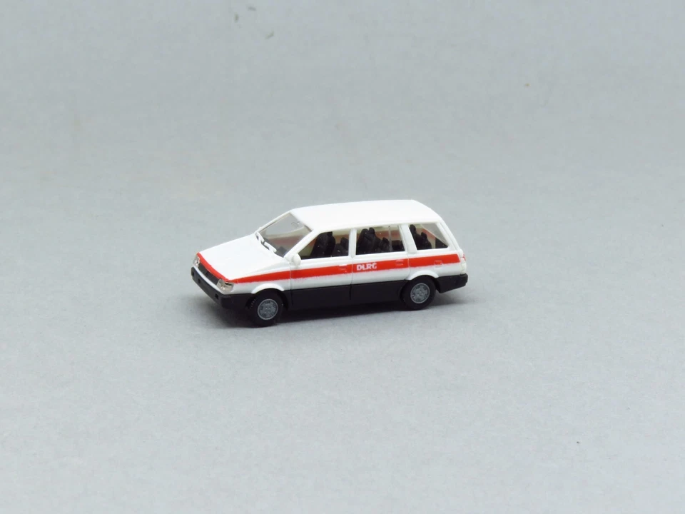 RIETZE MITSUBISHI SPACE WAGON DLRG BLANC - ECHELLE H0 1/87 - Photo 1/4