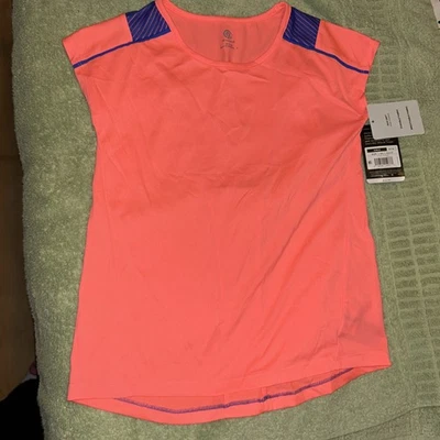 Camisa atlética sin mangas Champion para niñas talla M (7/8) naranja y púrpura nueva con etiquetas Foto 1 de 4