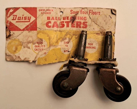 Pair of Vintage Daisy Ball Bearing Furniture Casters 1-1/4" Wheels NOS Unused Cover