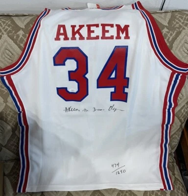 HAKEEM OLAJUWON SIGNED HOUSTON ROCKETS WHITE JERSEY JSA AUTOGRAPH 474/1250 JB - Image 1 of 4