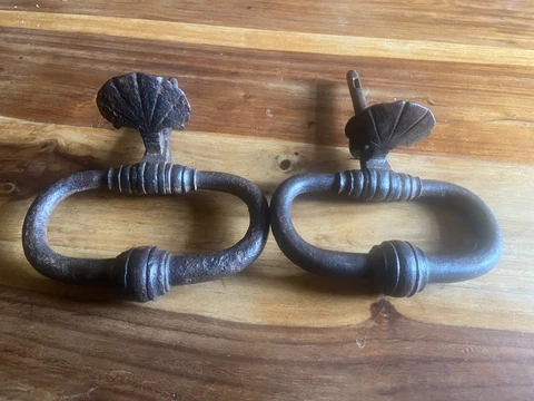 A pair of Maltese late 17th century door knockers Cover