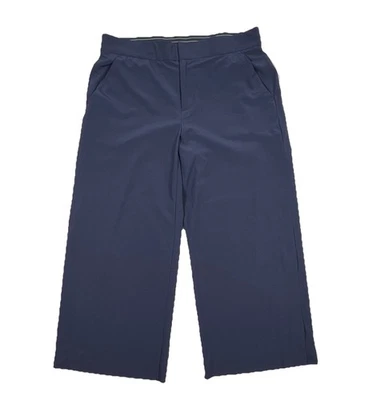 Pantalones recortados de pierna ancha ATHLETA 8 Tribeca para mujer azules laterales a presión de viaje Foto 1 de 4