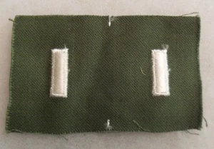 EARLY NAM WAR COLOR 1ST LT UNCUT PR BRASS FOR JUNGLE SHIRT & JACKET EMB ON TWILL - Picture 1 of 2
