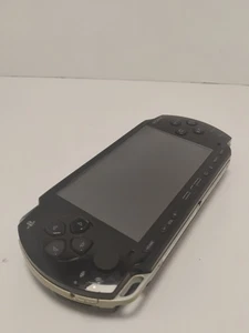 Sistema portátil Sony PlayStation PSP-1000 negro portátil solo para piezas o reparación - Imagen 1 de 13