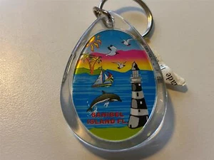 Florida Souvenir Sanibel Island Dolphins Keychain Bag Clip Lighthouse Boat Beach - Picture 1 of 4