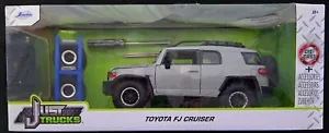 Jada Toys Just Trucks Serie Toyota FJ Cruiser con portapacchi e ruote extra 1/24 - Foto 1 di 6