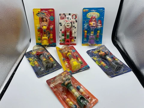 Retired DISNEY / MARVEL Tweety Flix Gumball Candy Machine Se OF 7- SEALED Cover