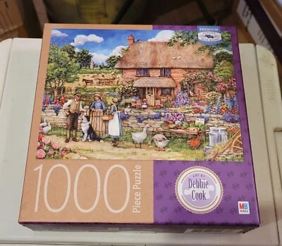 Rompecabezas Debbie Cook "FARM COTTAGE" 1000 piezas 20" x 27" caja abierta usado en excelente estado Foto 1 de 4