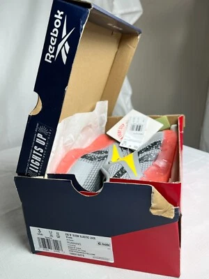 Zapatillas deportivas Reebok Zig N' Glow unisex niños gris naranja encaje elástico talla 3 Foto 1 de 4