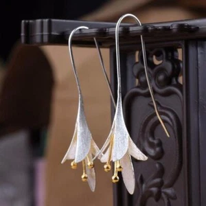 Orecchini Fiori Intagliati Argento e Oro - Gioielli Floreali in Metallo di Tendenza per Donna - Foto 1 di 24