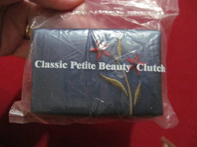 AVON CLASSIC PETITE BEAUTY CLUTCH NAVY BLUE SATIN NOS/SEALED - Image 1 of 1