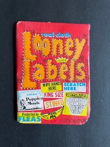 LOONEY LABELS (REAL CLOTH) FULL UNOPENED VINTAGE WAX TRADING CARD PACK BY FLEER - Bild 1 von 2
