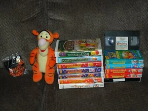 Lot of 13 Vintage Winnie The Pooh VHS Tapes Clam Shell Sleeves + 2 Plush Toys - Picture 1 of 16