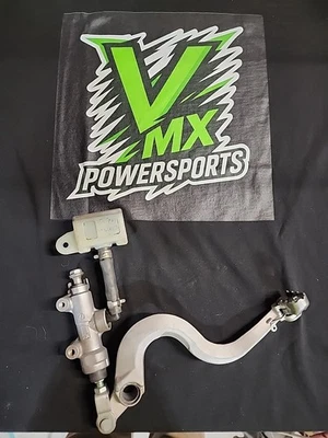 Kawasaki KX125 1995 OEM pedal de freno trasero con cilindro maestro limpio completo Foto 1 de 4