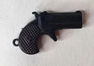 Vintage Miniature Vintage Gun Toy Pistol Derringer Tiny Plastic Keychain - Picture 1 of 3