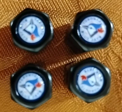 WinCraft Toronto Blue Jays 4-Pack Valve Stem Covers. New In Bag. Opened For Pic - Image 1 of 4