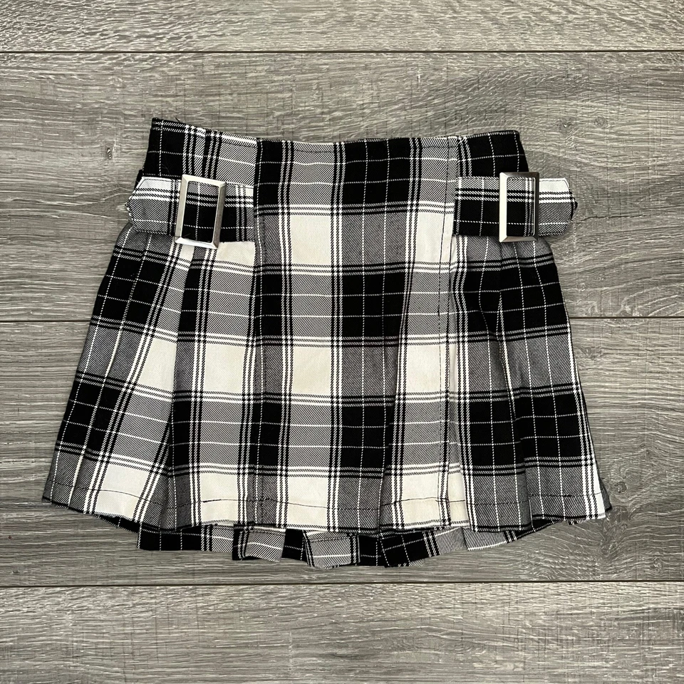 Mini falda plisada a cuadros negra Justice Girls talla 6 hebillas elásticas espalda Foto 1 de 4