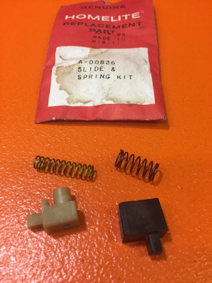 GENUINE HOMELITE RYOBI ST30 ELECTRIC TRIMMER SLIDE & SPRING KIT A00826 NEW -B28 - Image 1 of 1