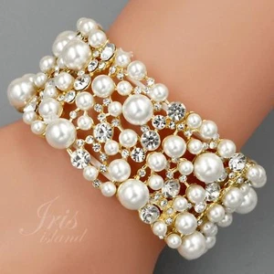Brazalete elástico de boda de cristal transparente enchapado en oro con perlas 09806 - Imagen 1 de 5