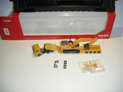 Herpa 312301 MAN TGX XLX Nooteboom Tieflader Liebherr Bagger 954 Leonhard Weiss - Bild 1 von 4