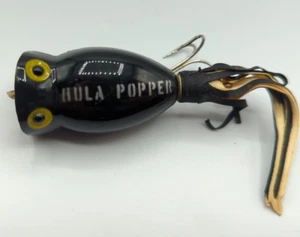 Vintage Arbogast Hula Popper Luminous Topwater Crankbait Köder schwarz und rot - Bild 1 von 6