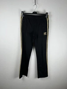 Adidas Pantaloni Tuta TrackPants Trousers Nero Oro Taglia XS Donna - Foto 1 di 12