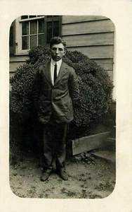 Man in Suit circa 1915 RPPC standing outside house Postcard - Picture 1 of 2