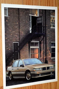Pontiac Grand Am SE 1986 distribuidor original anuncio impreso 86 dorado - Imagen 1 de 1
