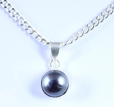 Colgante de piedras preciosas redondas naturales de 6,90 quilates de perlas negras del Mar del Sur de Tahití para hombre Foto 1 de 4