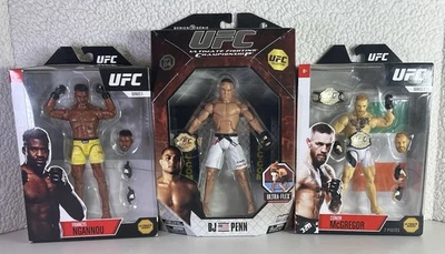 Lot Of 3 UFC McGregor, Penn and Gnannou Action Figures with Belts NIB Sealed - Image 1 of 4