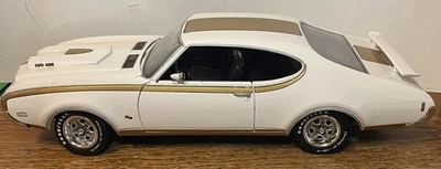 ЛИТАЯ МОДЕЛЬ ERTL AMERICAN MUSCLE 1969 OLDSMOBILE OLDS HURST 455 БЕЛОЕ ЗОЛОТО 1:18 - Изображение 1 из 4
