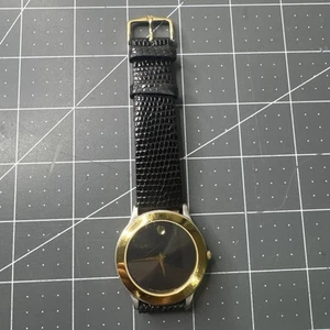 Orologio Vintage Movado Museum Swiss Made Oro + Quarzo Zaffiro Nero 8745882 - Foto 1 di 7
