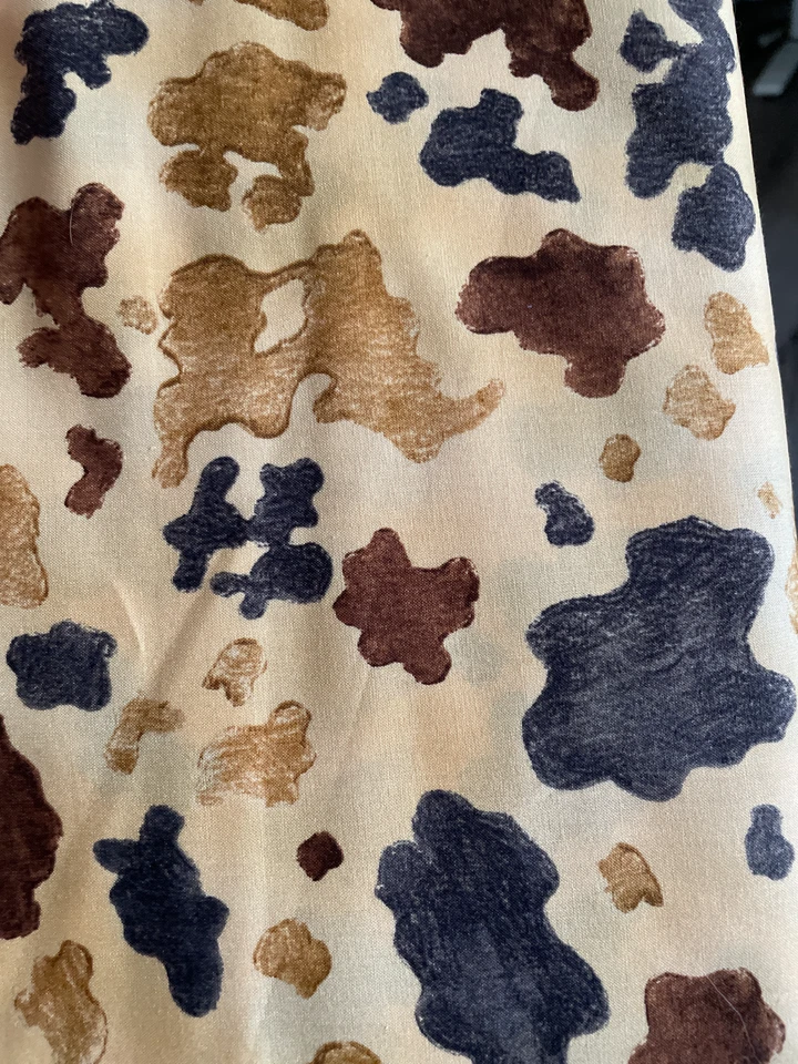 The Udder Cowboy Cow Spotsby Moda fabrics Brown 51227 12~By The Yard - Image 1 of 1