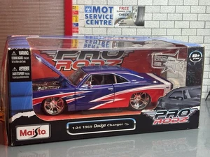 1:24 *EN CAJA* CARGADOR DODGE R/T AZUL LHD MAISTO PRO RODZ 1969 *RARO*! - Imagen 1 de 3