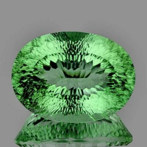 Paraiba Green Fluorite 107.49 carat Oval 35x27 mm Concave Cut, Flawless-VVS - Picture 1 of 2