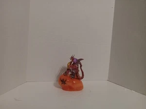 multi color red & purple sitting on stone that changers color battery operated - Picture 1 of 11