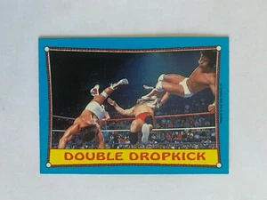 1987 O-Pee-Chee WWF #33 Double Dropkick RA - Picture 1 of 2