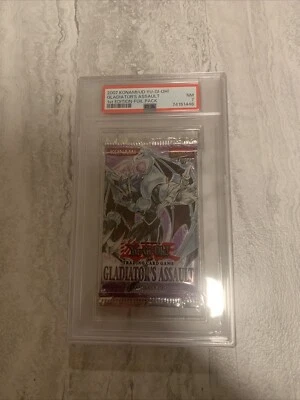 PSA 7 YUGIOH Gladiator's Assault 1st Edition Sealed Booster Pack - Image 1 of 2