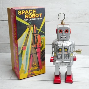 Walking Silver Metal Robot Wind Up Eyes Spark Motor SCHYLLING Collectors - Picture 1 of 8