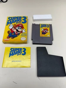 SUPER MARIO BROS 3 NES NINTENDO MIT BOX/ HANDBUCH FUNKTIONIERT SCHÖN - Bild 1 von 14
